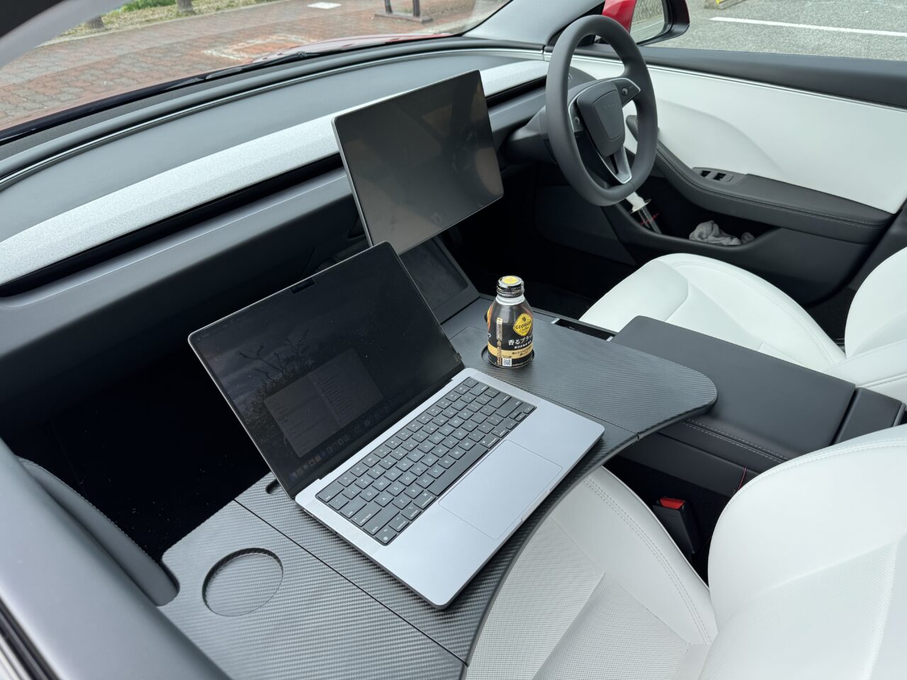 Tesla Model 3 interior | car, interior, laptop, coffee, parking lot, TESLA, Model 3