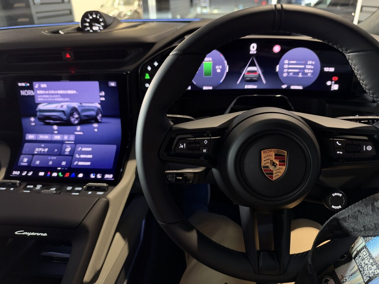 The Cayenne Electric’s cockpit and steering wheel
