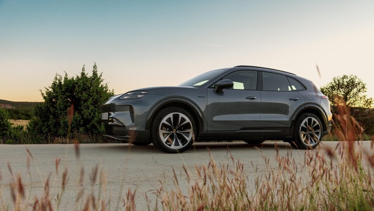 Side view of the Cayenne Electric parked by the coast